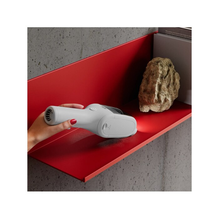 Product vacuuming fine dust on a shelf
