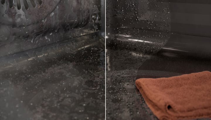 Een vervuilde oven wordt gereinigd met stoom.