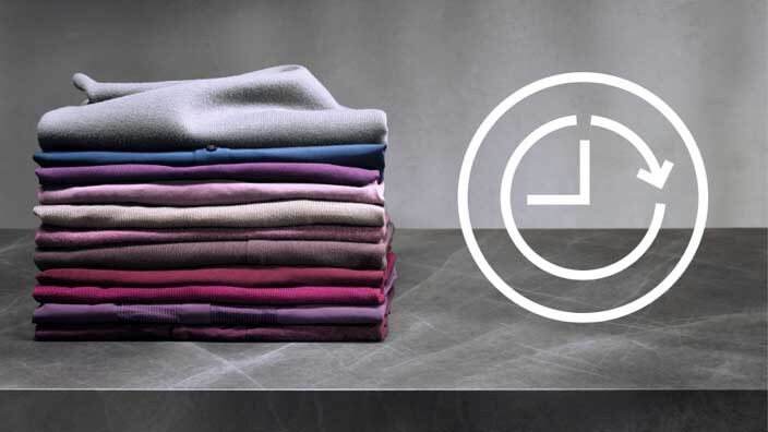 Kleren op stapels & startuitstel icoon