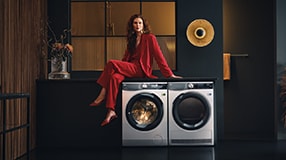 Femme sur une machine &#xE0; laver